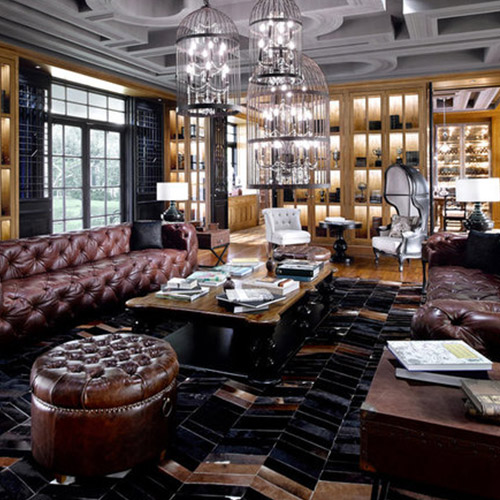 Layered lounge interior with custom furniture and warm timber cabinetry